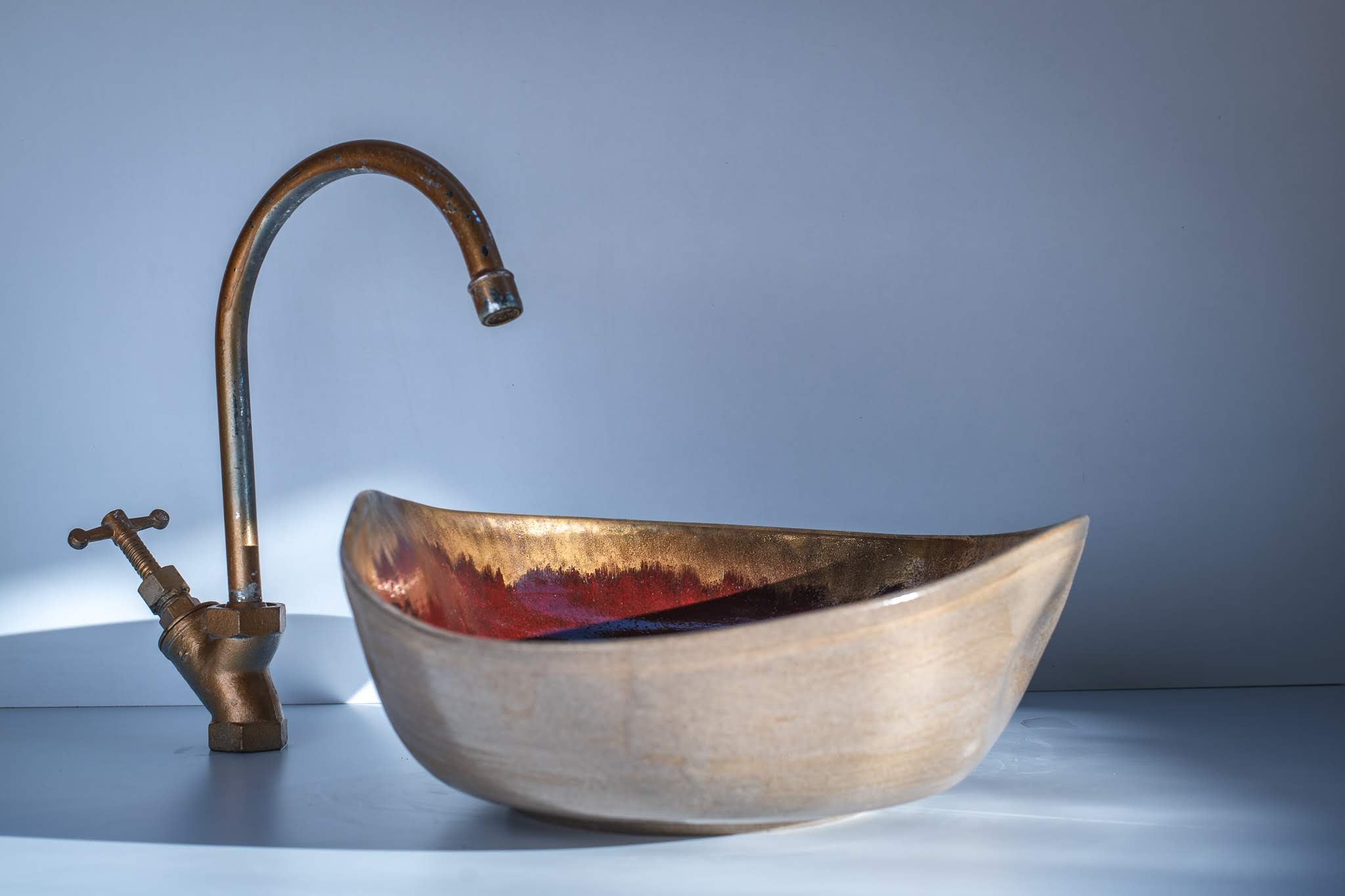 Gold Feather Handcrafted sink by Naiimpottery